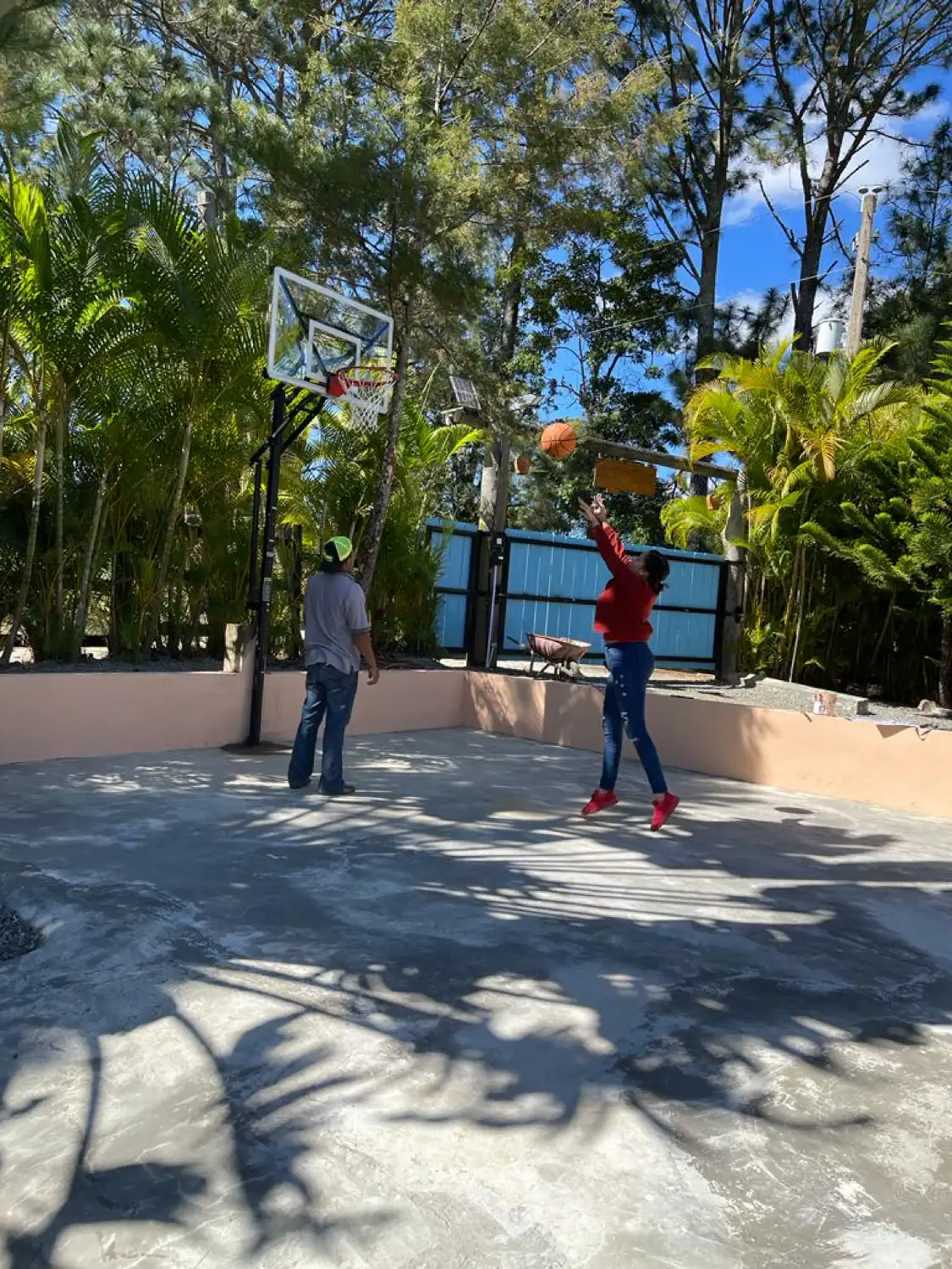 Shooting hoops on the basketball court