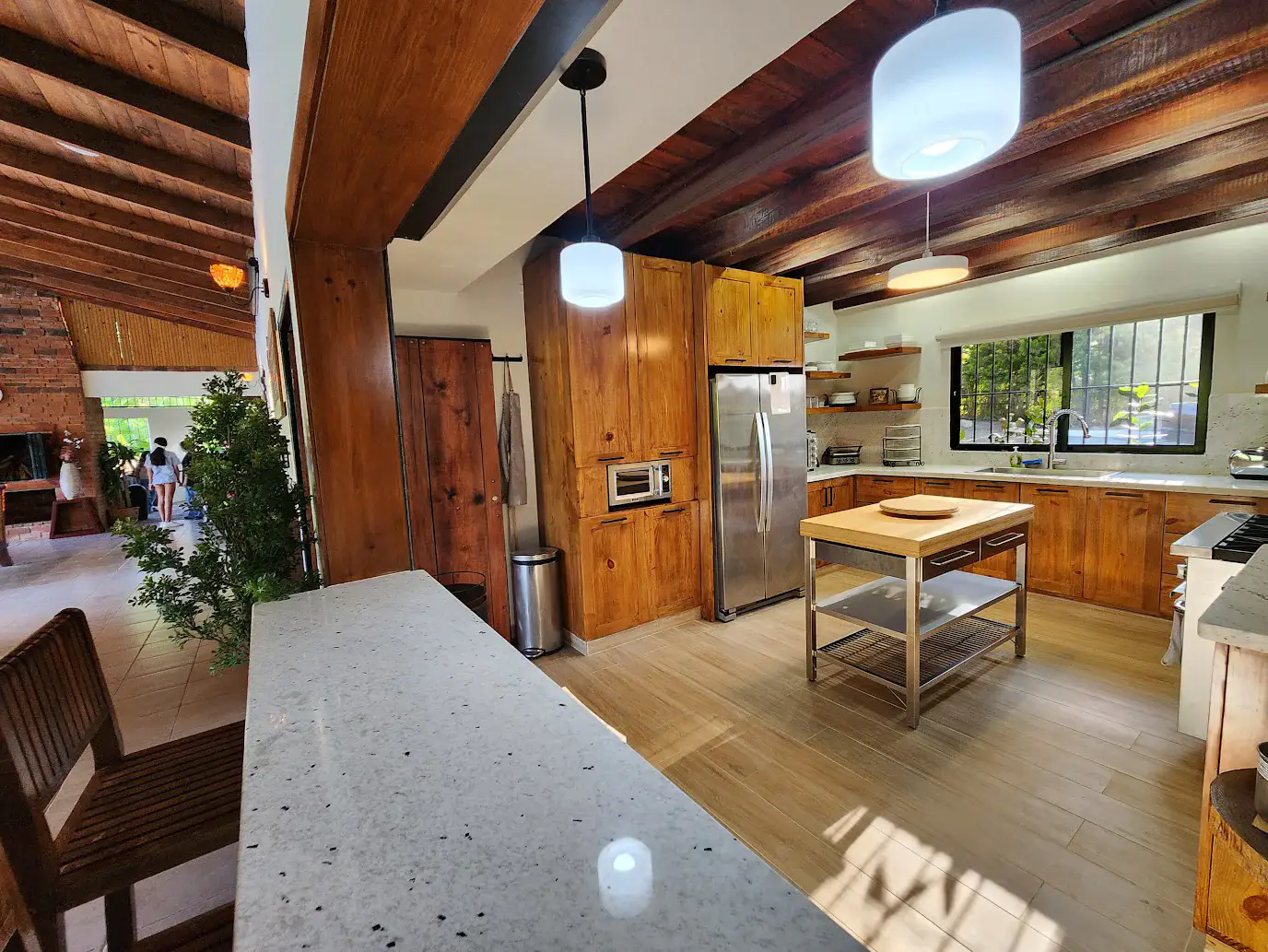 The kitchen opening onto the great room