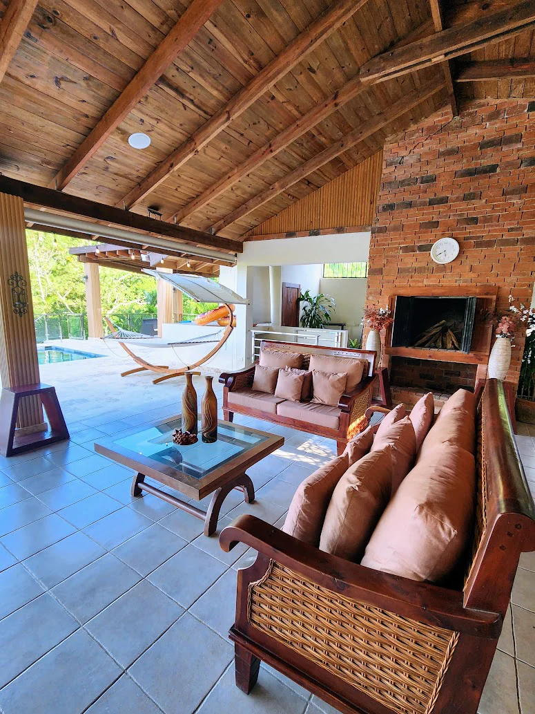 The covered lounge and fireplace