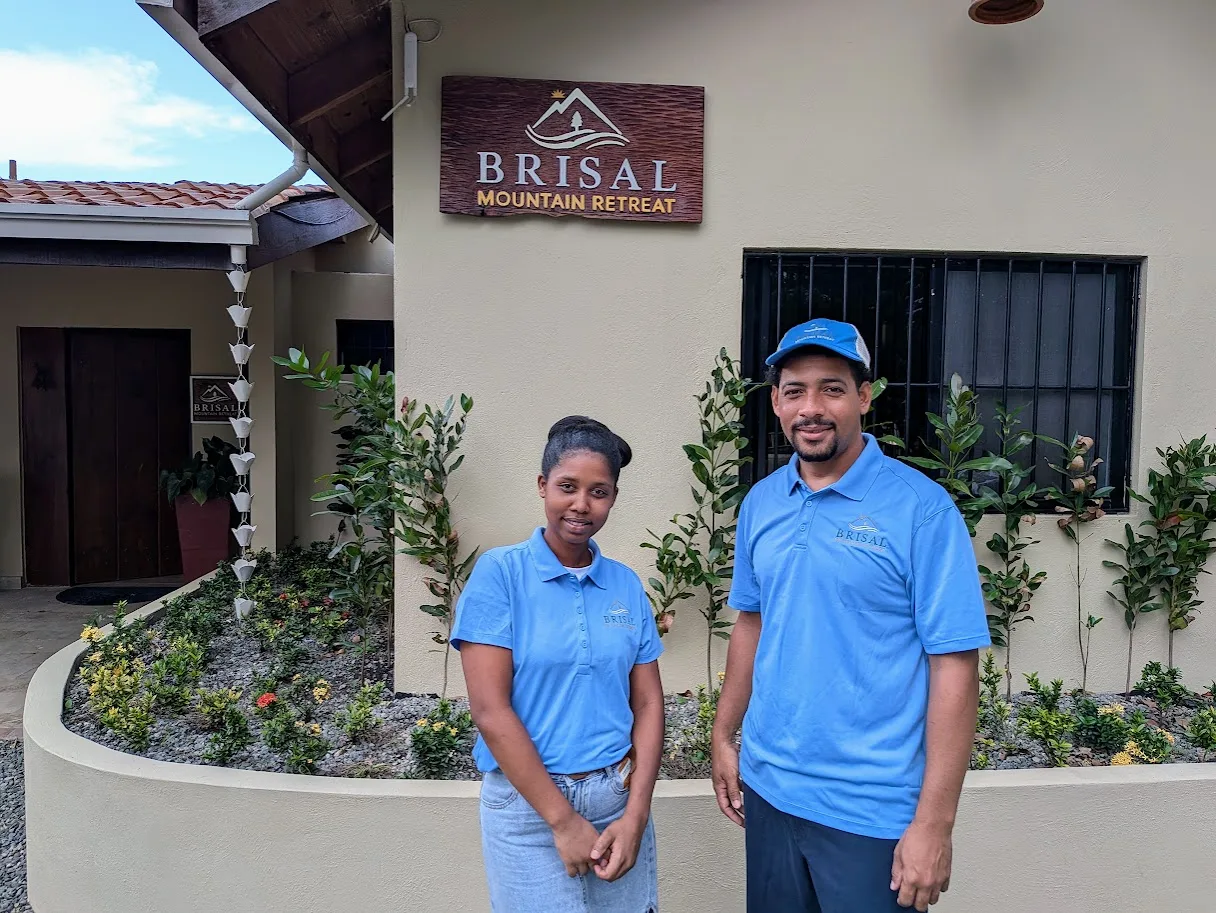 The Brisal team in front of the entrance sign