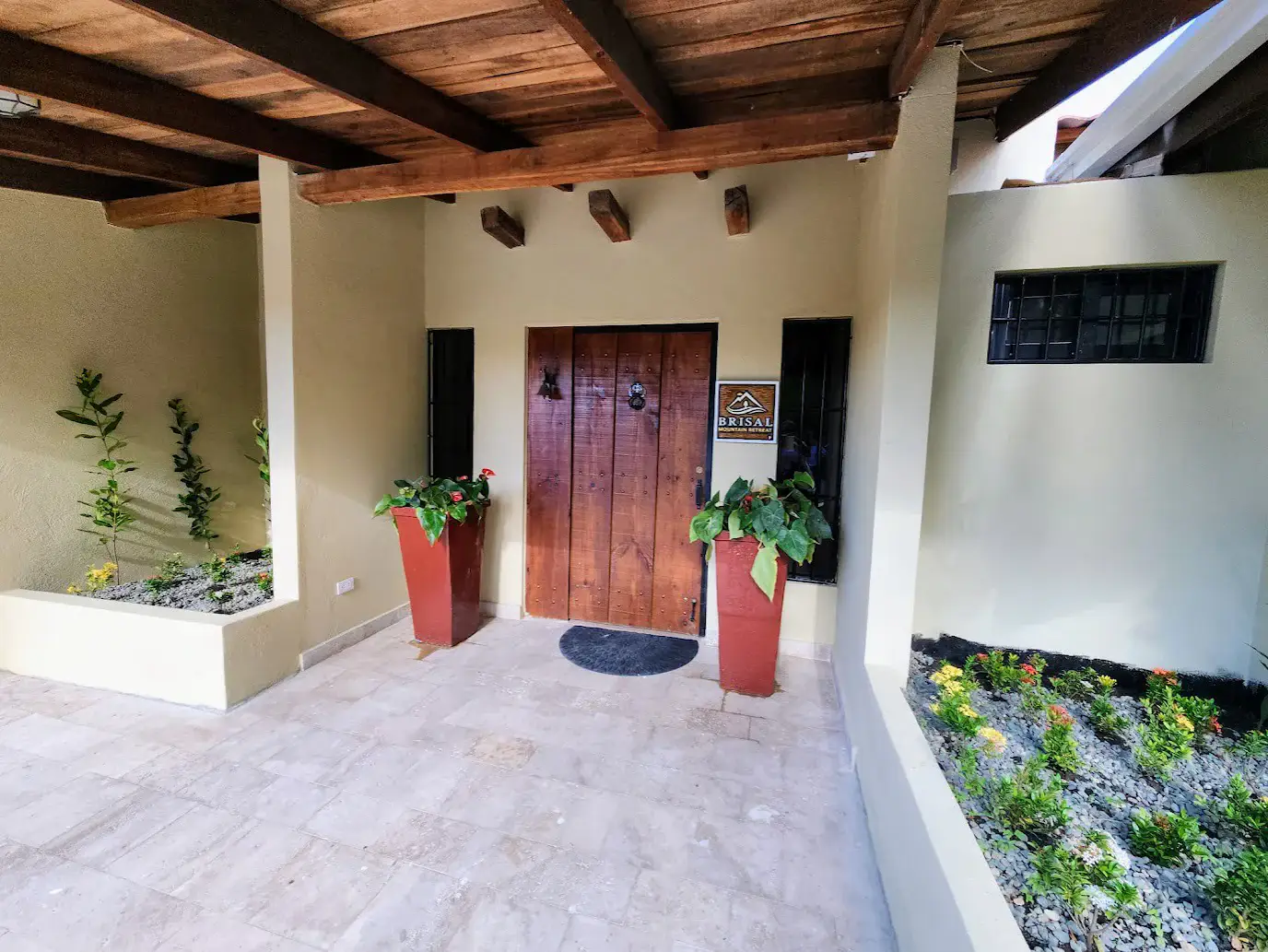 The villa’s covered front entrance